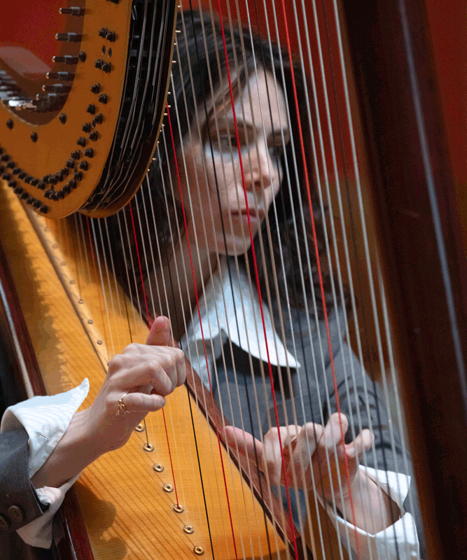 Esther playing the harp